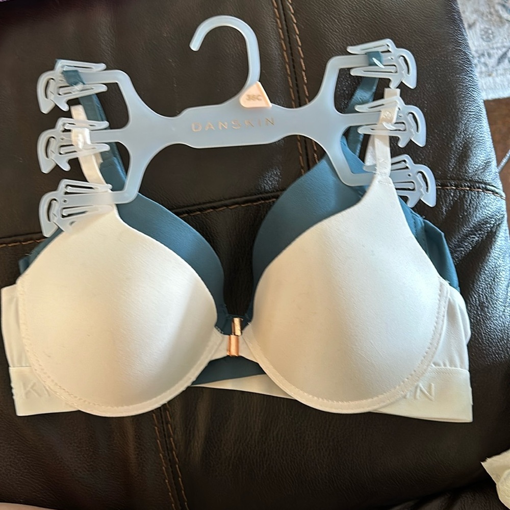 Danskin bras. Front closure. 3 total. Pink, Green and white. 36C